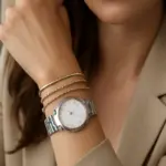 Come abbinare bracciali e orologi nello stesso polso? Un metodo facile per un risultato elegante